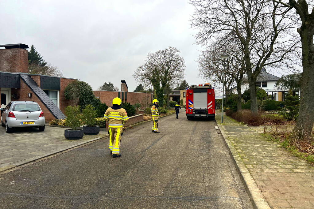 Gaslekkage in voortuin van woning