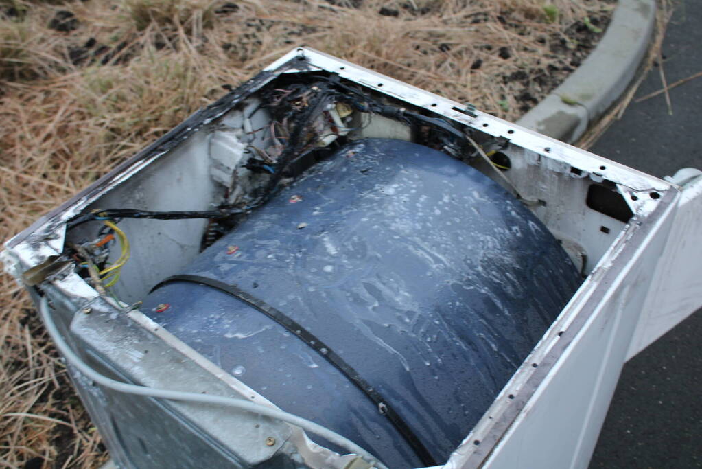 Wasdroger in brand in flatwoning