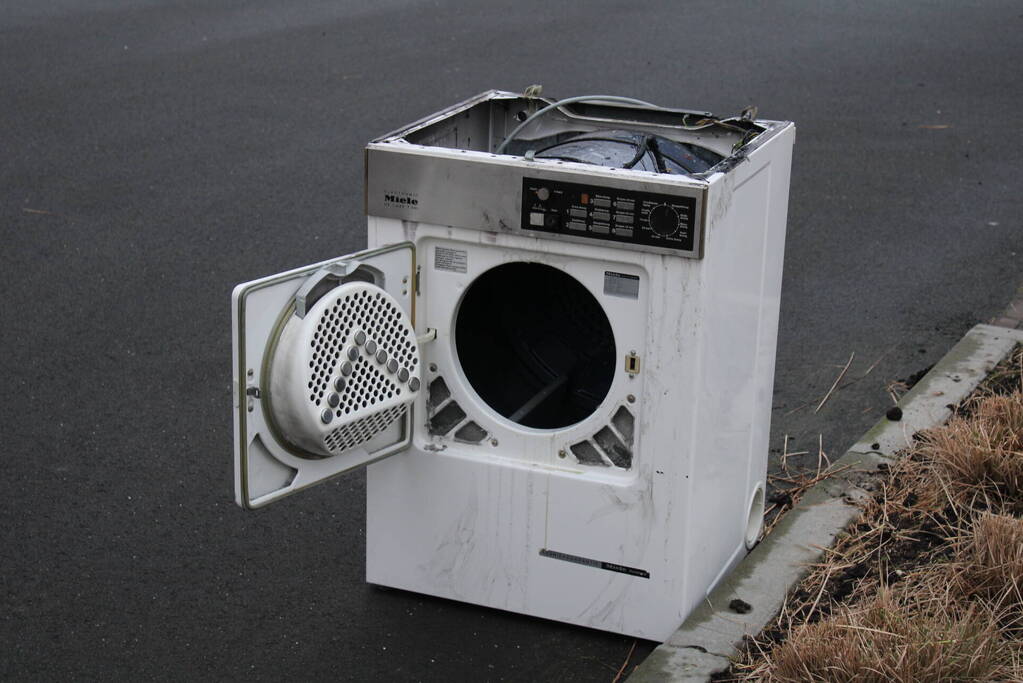 Wasdroger in brand in flatwoning