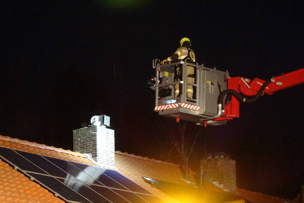 Schoorsteen geveegd na brand