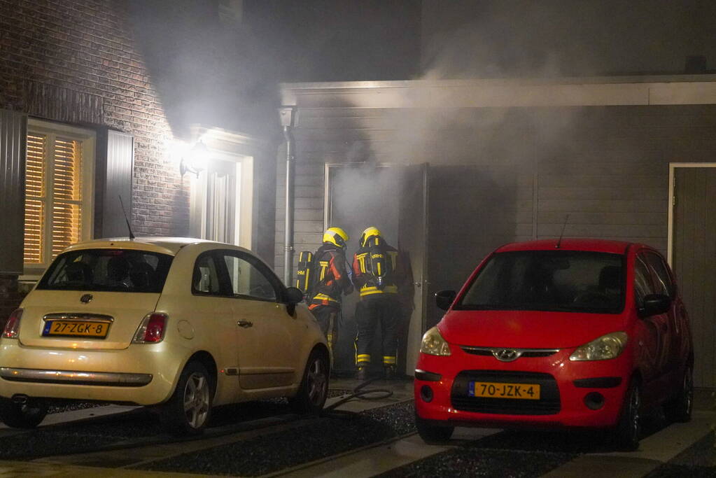 Brand in een schuur naast de woning