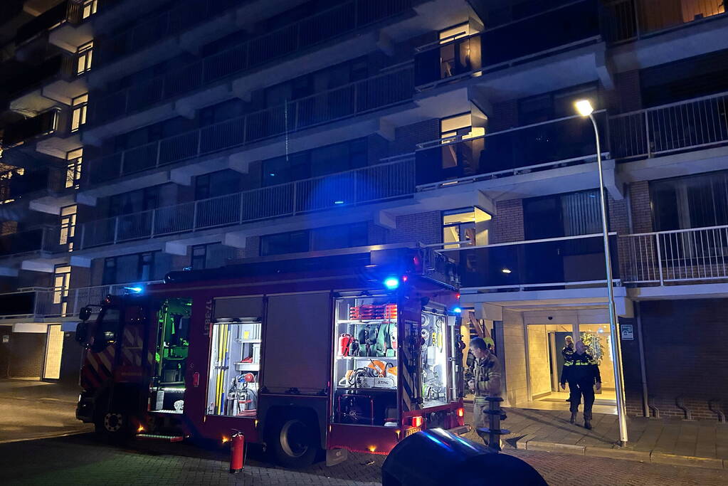 Brand in keuken van flatwoning
