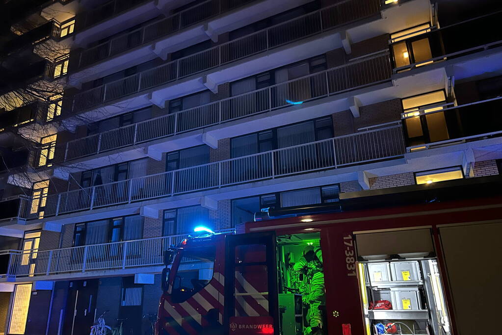 Brand in keuken van flatwoning