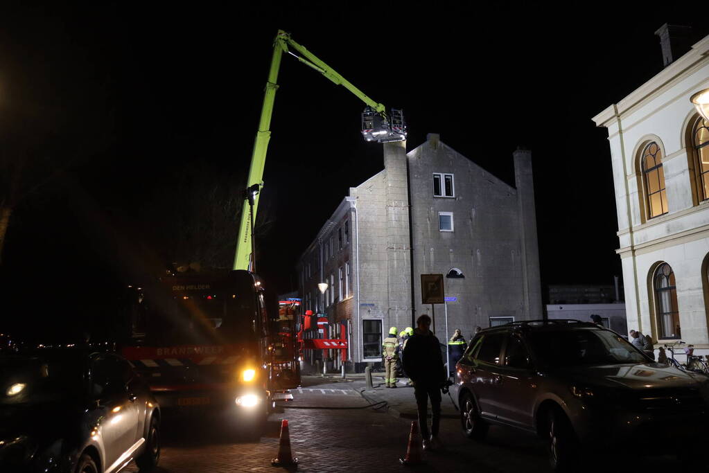 Brand in schoorsteen van woning