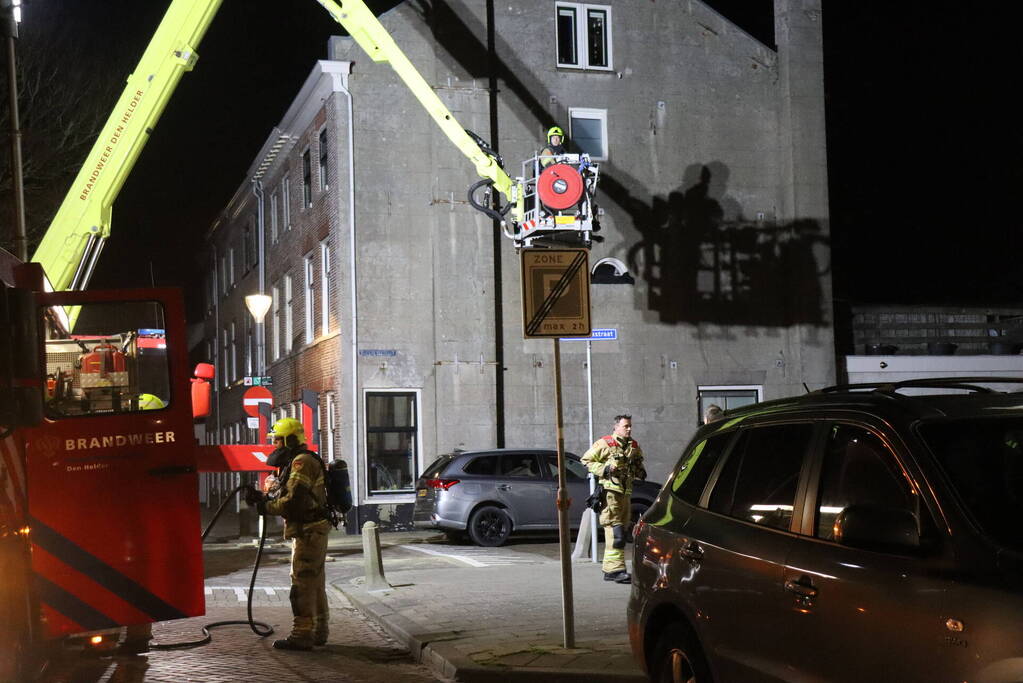 Brand in schoorsteen van woning