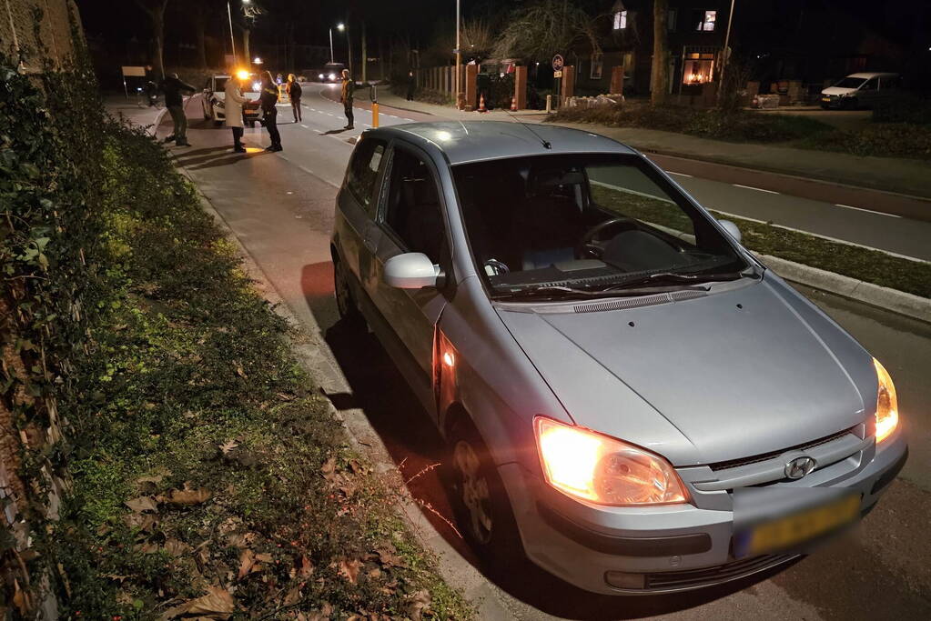 Schade na botsing tussen scooter en auto