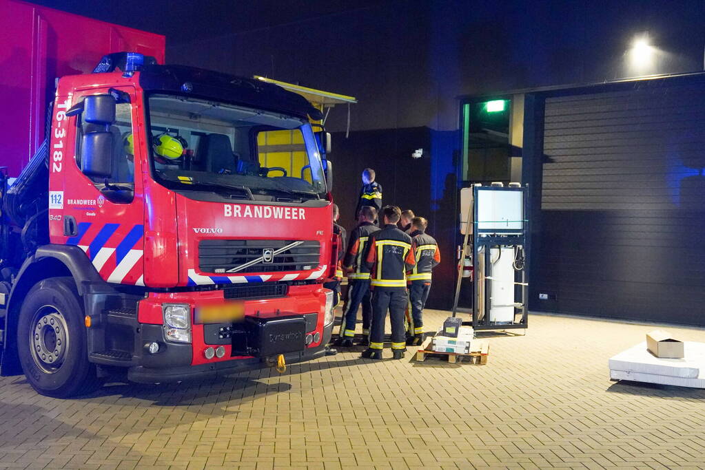 Man bekneld achterin trailer vrachtwagen