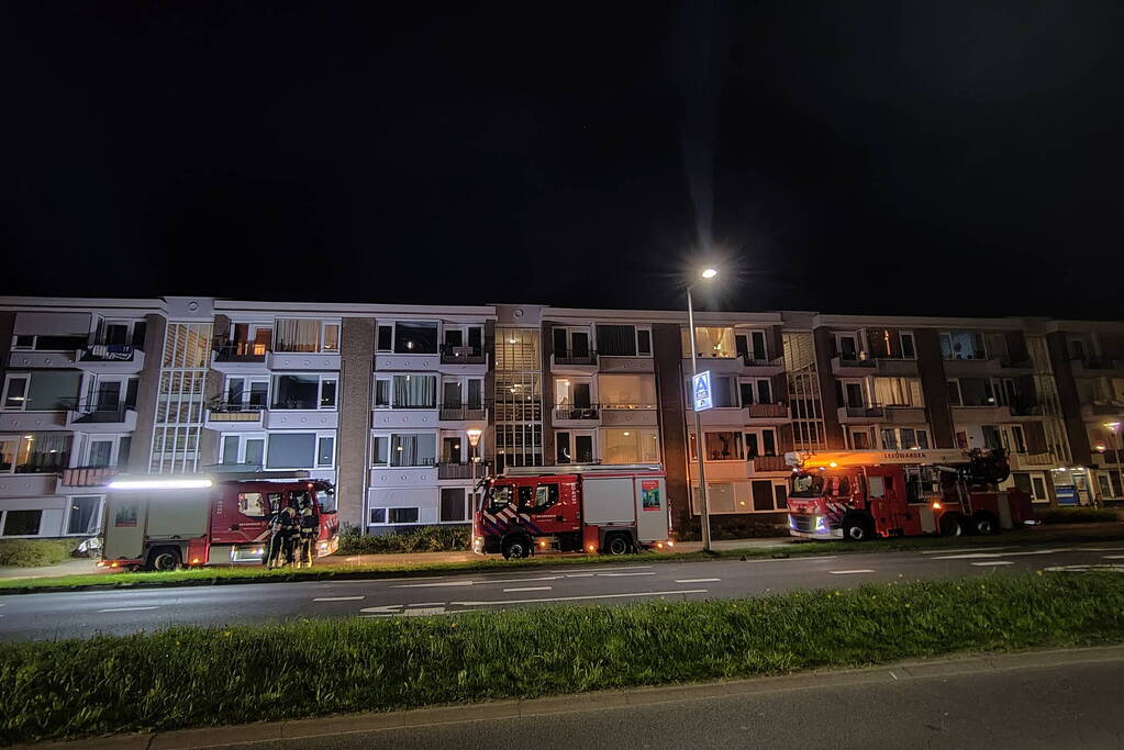 Brand in portiek woning snel geblust