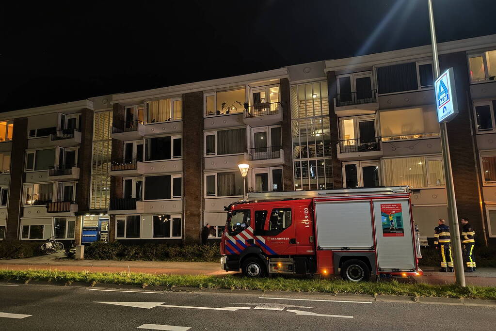 Brand in portiek woning snel geblust