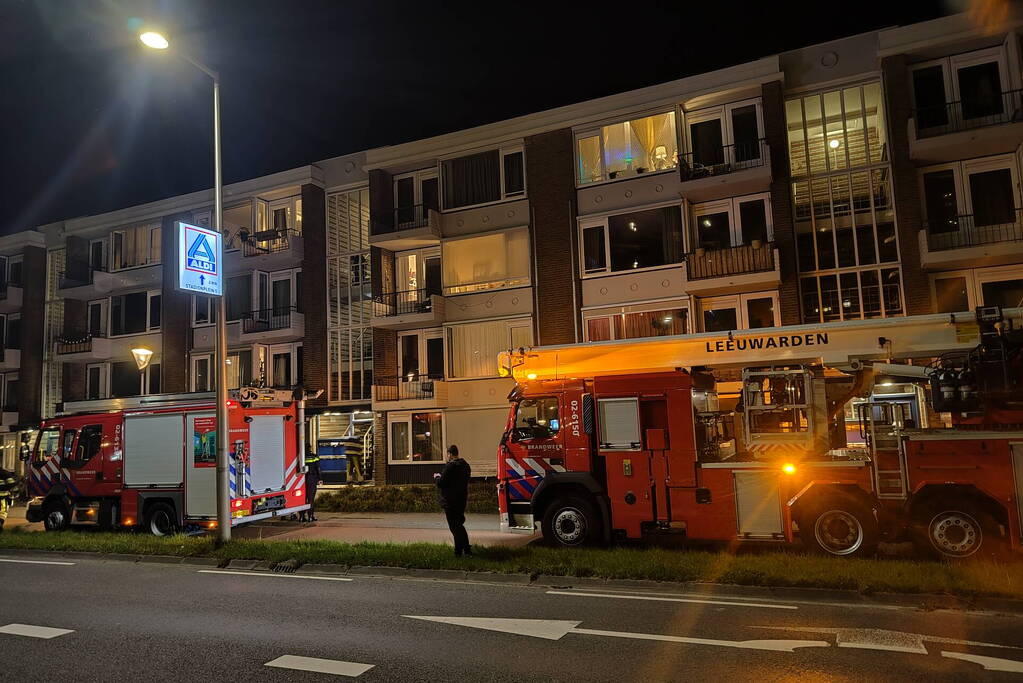 Brand in portiek woning snel geblust