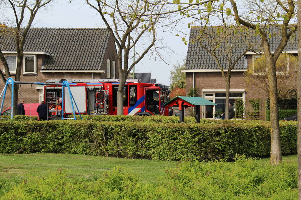 Brand in garage door sleutelen aan auto