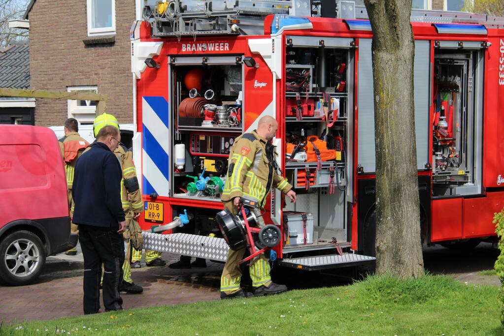 Brand in garage door sleutelen aan auto