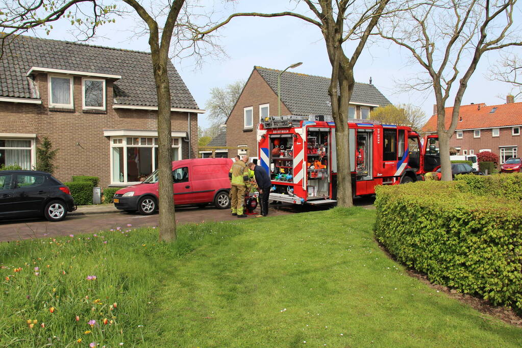 Brand in garage door sleutelen aan auto