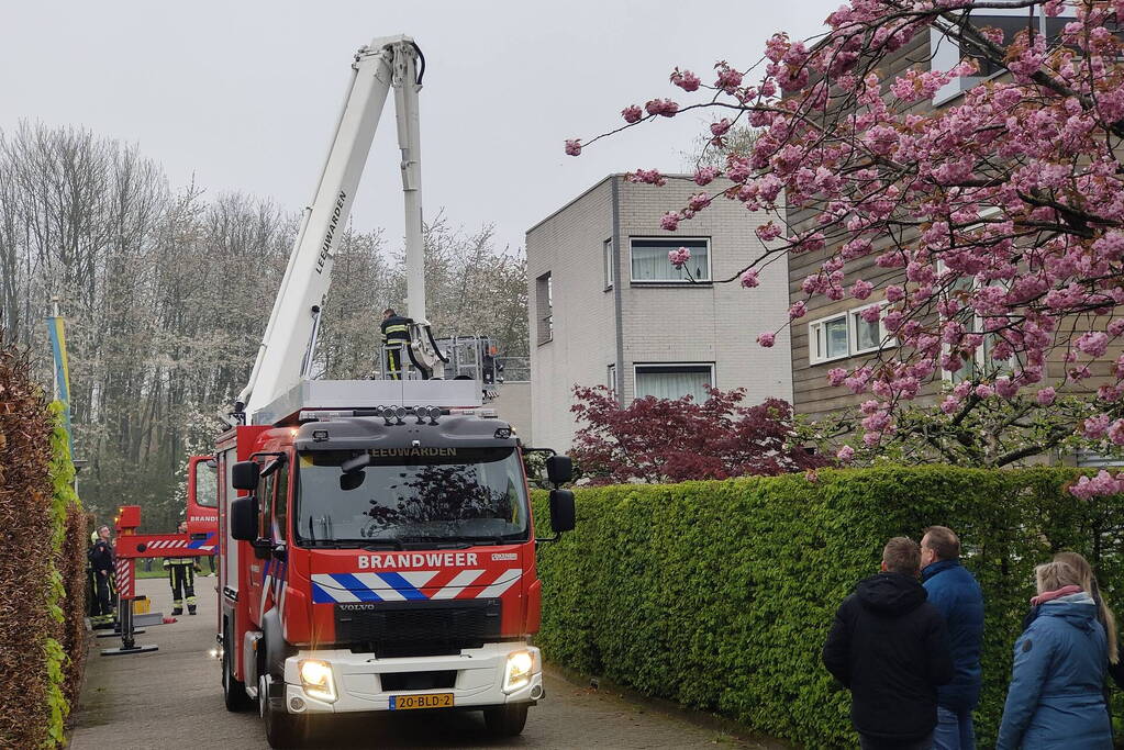 Schoorsteen geveegd na brand