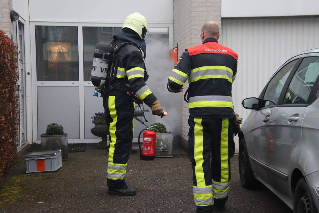 Schoorsteen geveegd na brand