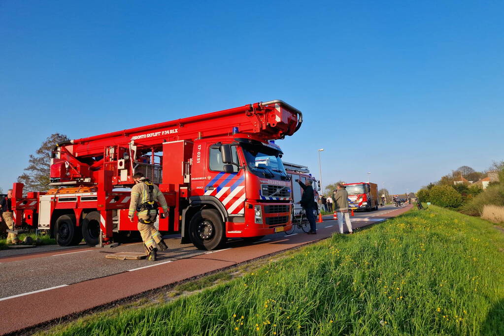 Brand in rietenkap van woning