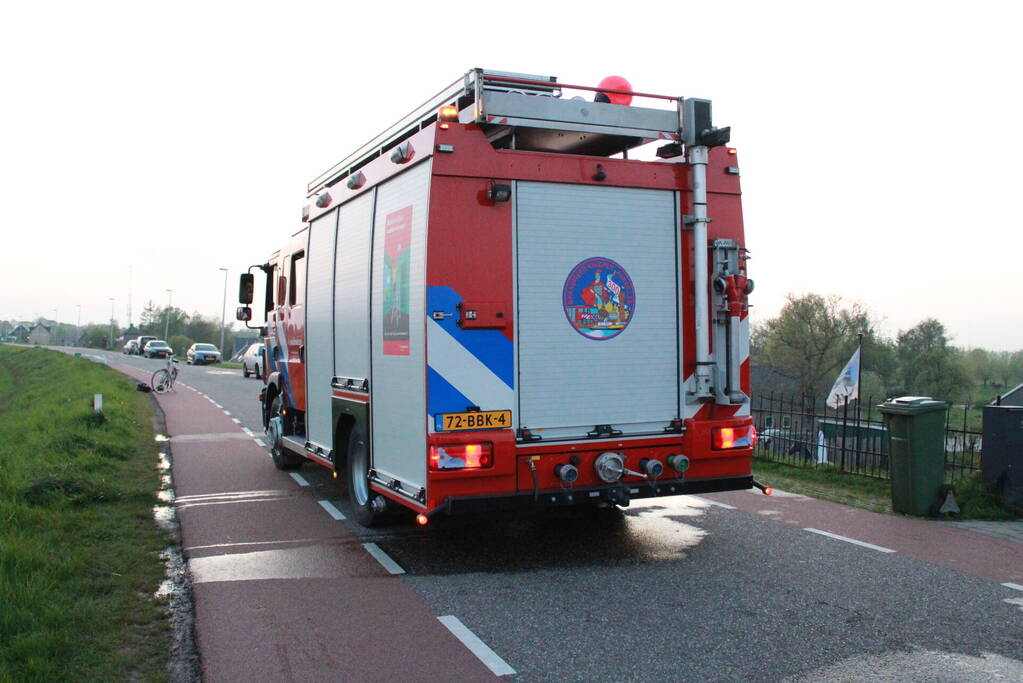 Brand in rietenkap van woning