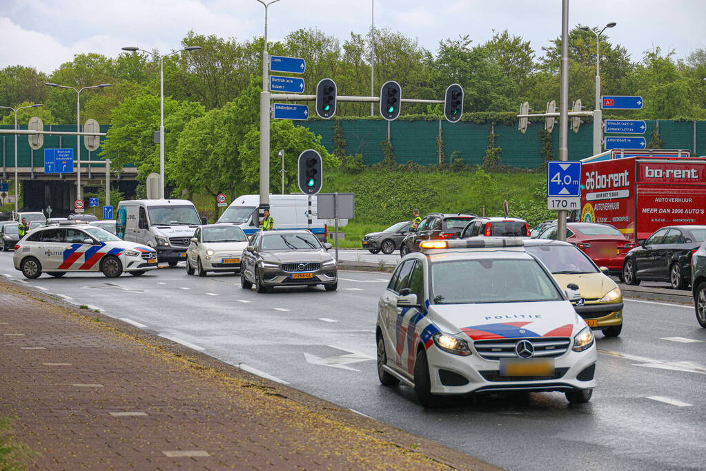 Flinke schade en gewonden bij kop-staart botsing