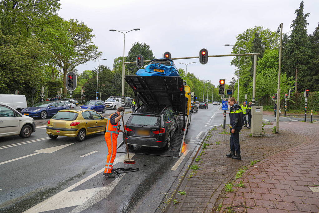 Flinke schade en gewonden bij kop-staart botsing