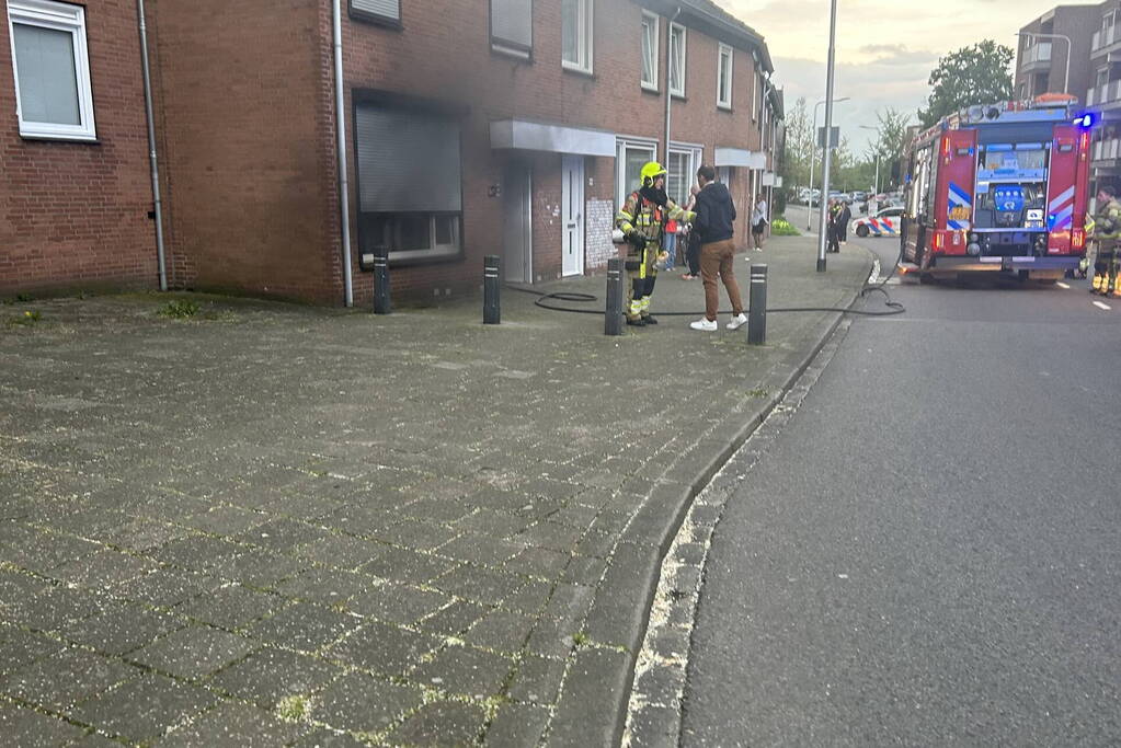 Veel rook bij brand in woning