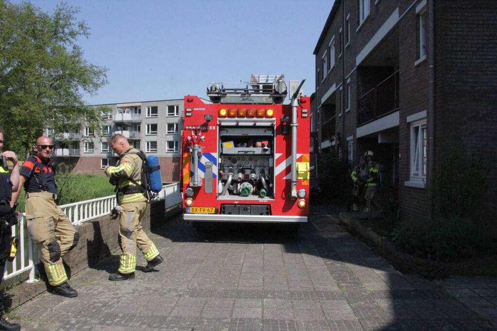 Pan op kookplaat vat vlam