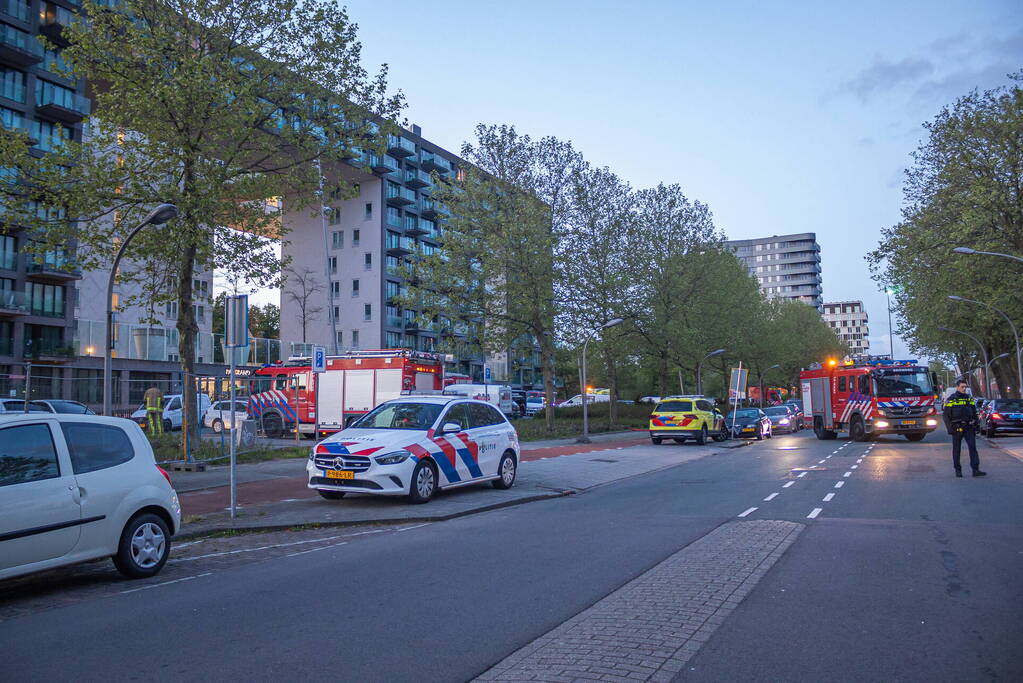 Gezin van balkon gered na brand