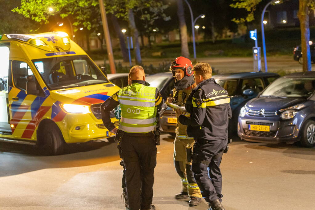 Gezin van balkon gered na brand