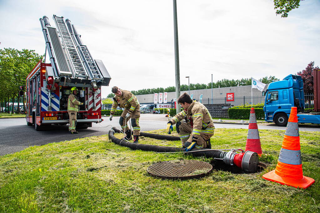 Brand in perscontainer met papier