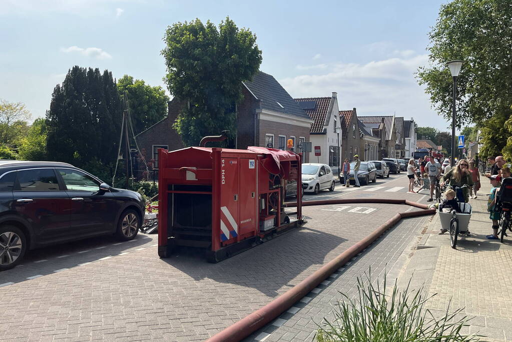 Brand in schuur op woonerf