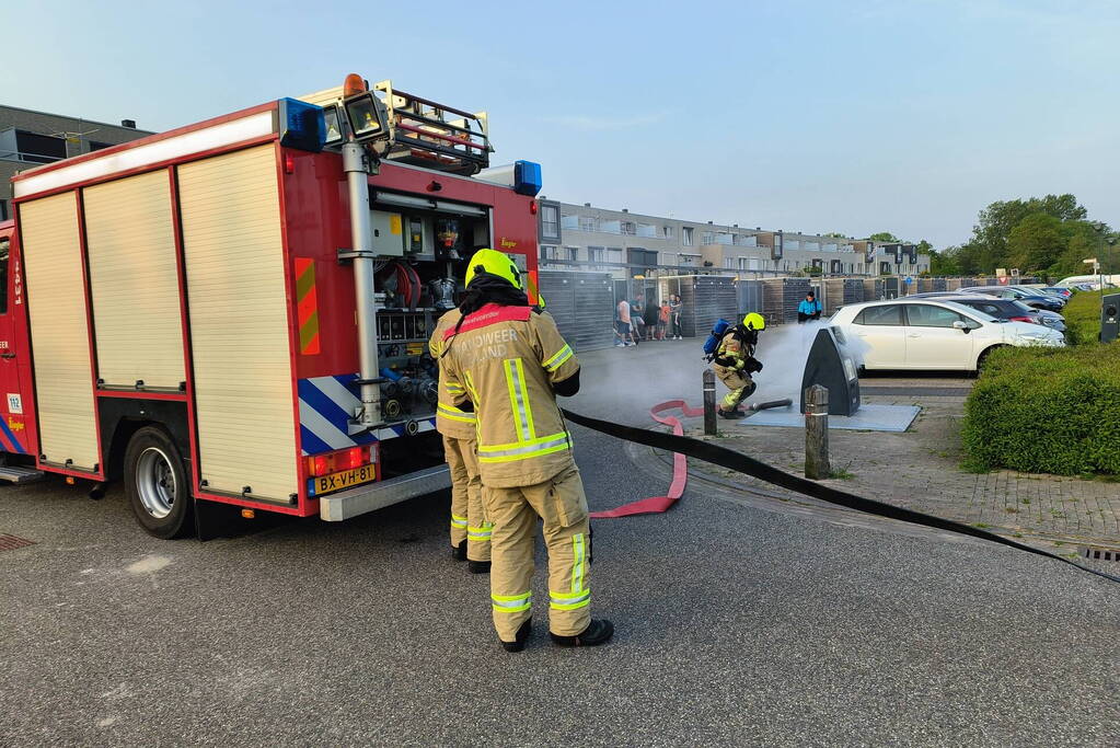 Brand in container snel onder controle