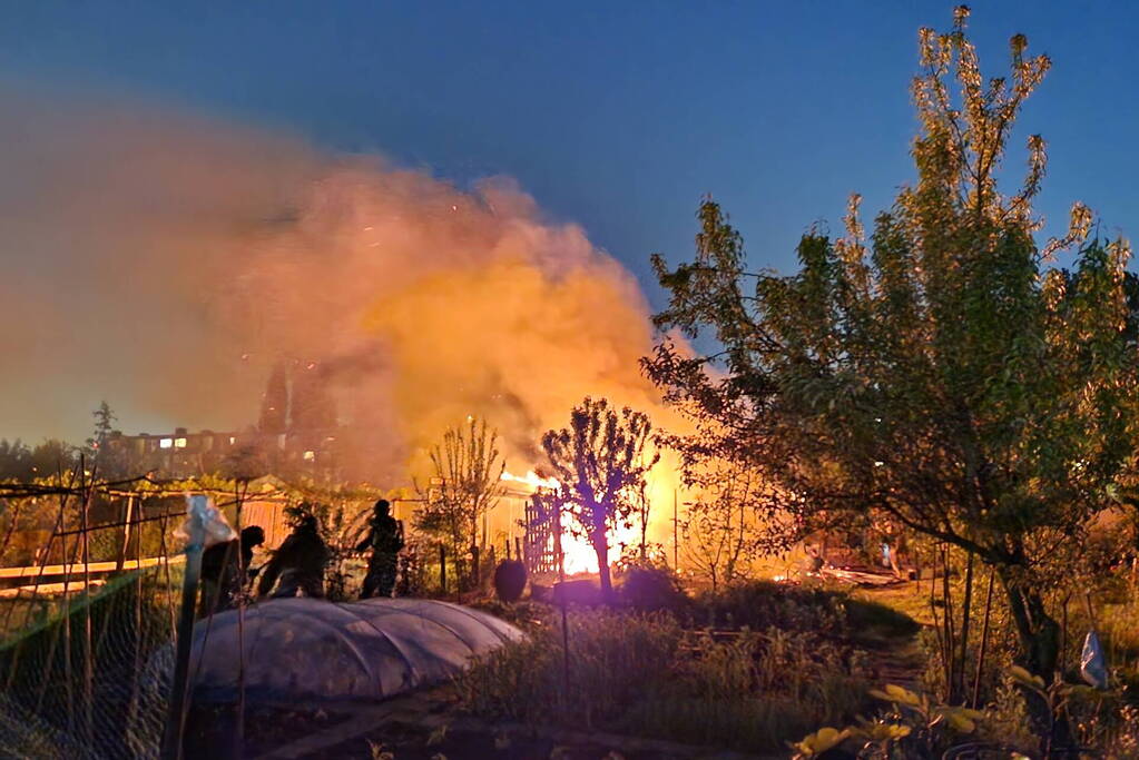 Tuinhuis in as na felle brand