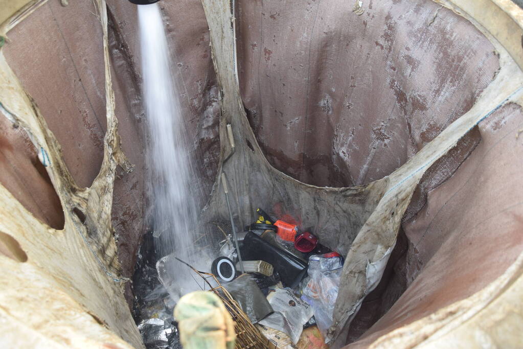 Container in brand door BBQ