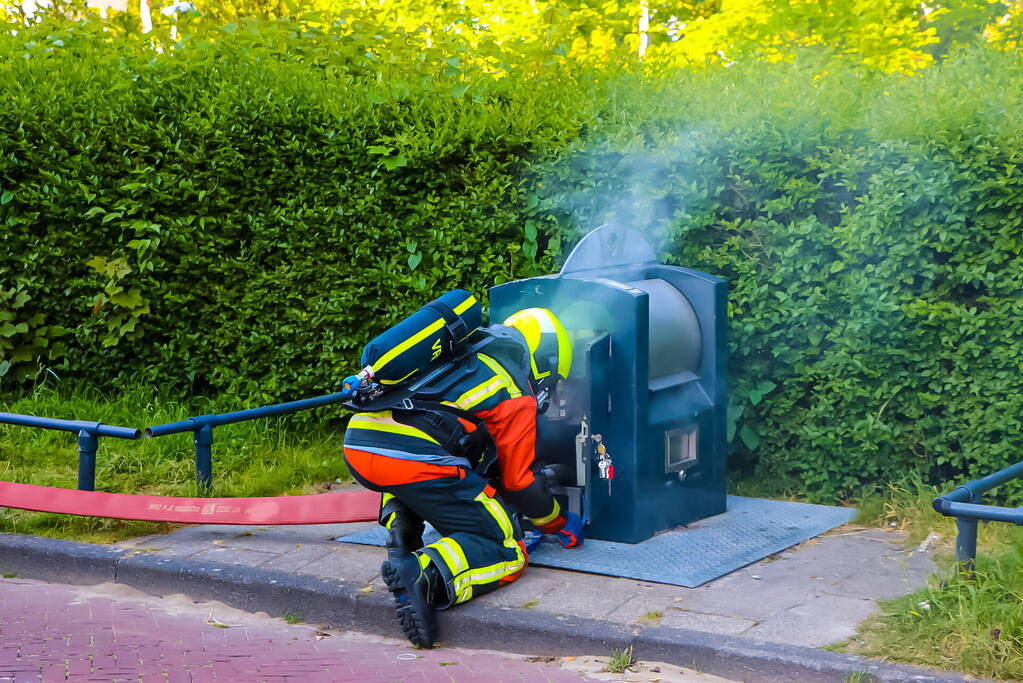 Brand in ondergrondse container