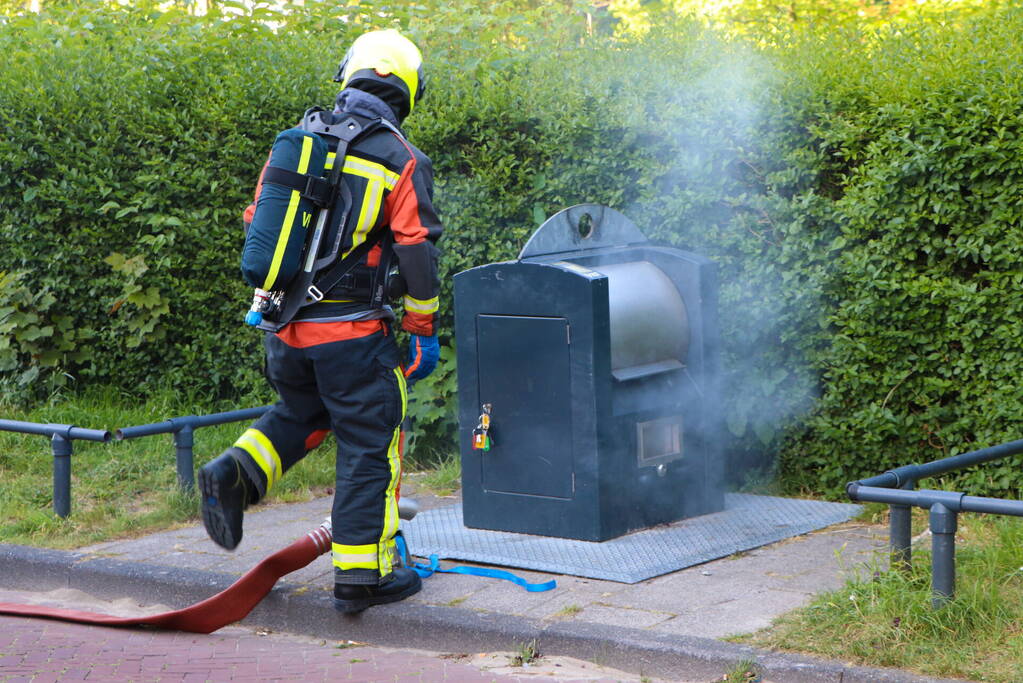 Brand in ondergrondse container