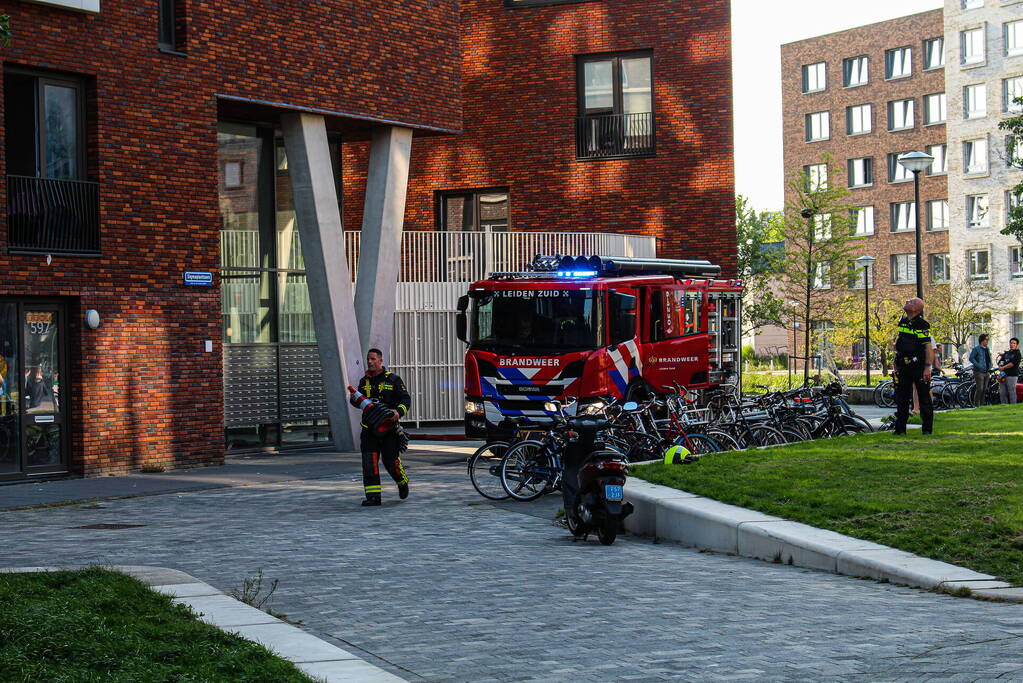 Brand in woning op achtste etage