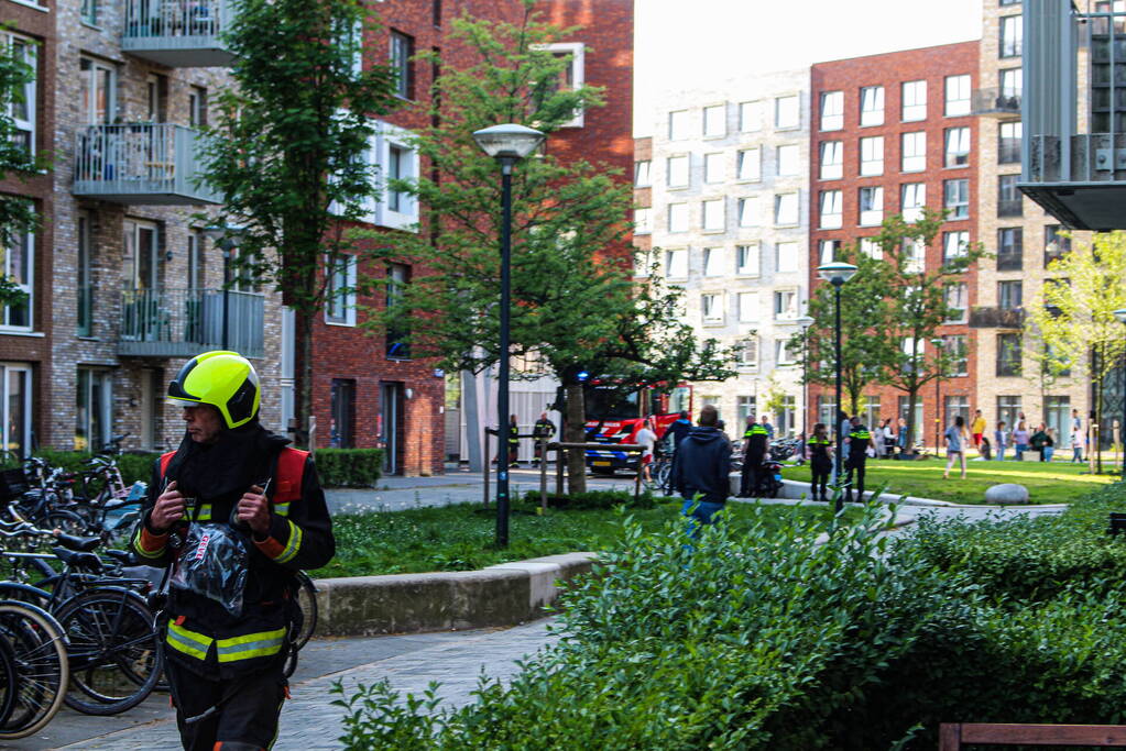 Brand in woning op achtste etage