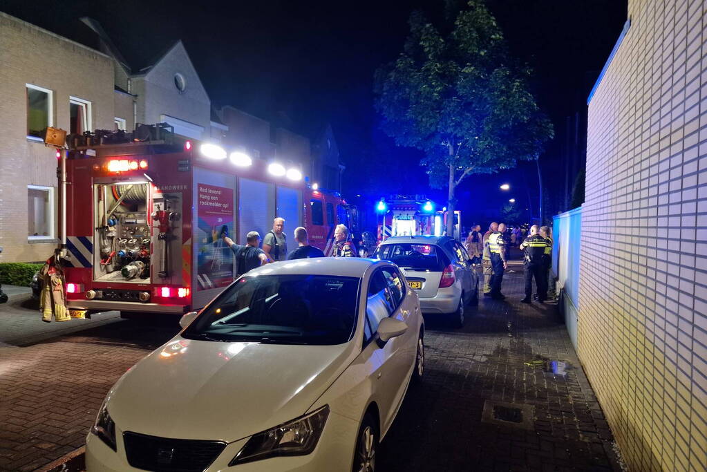 Buurman ontdekt brand in woning