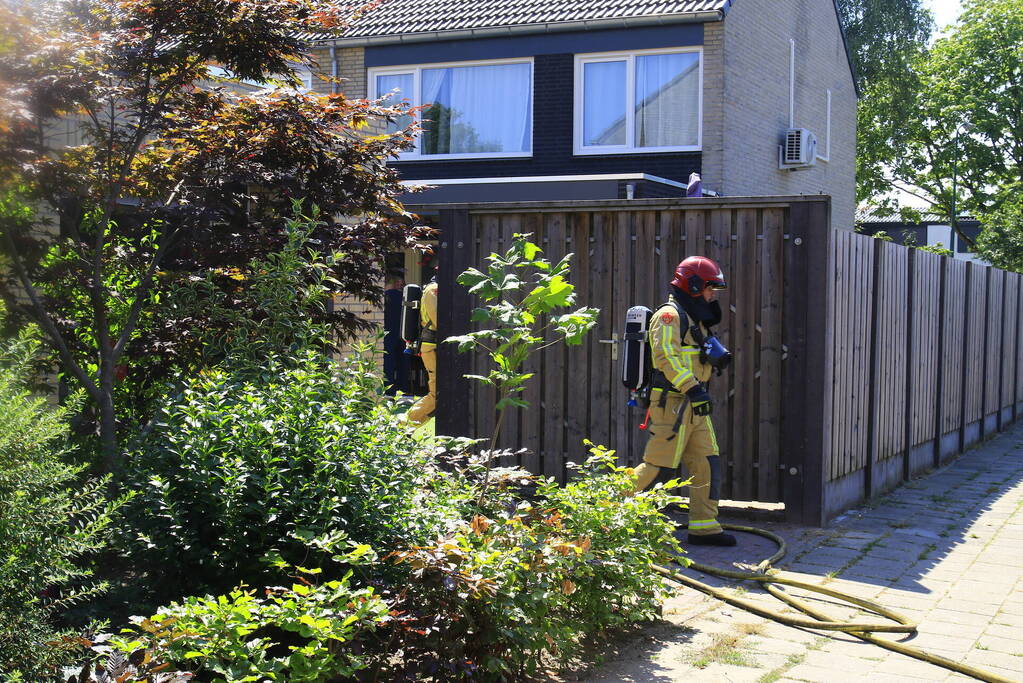 Brand in garage van woning