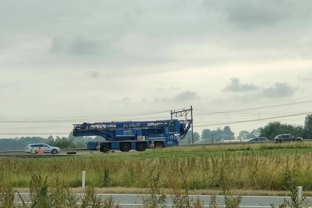 File na stilgevallen kraanwagen
