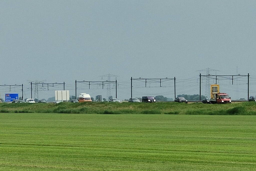 File na stilgevallen kraanwagen