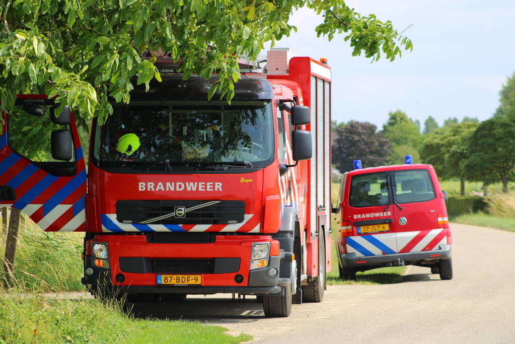 Brand in muur van schuur