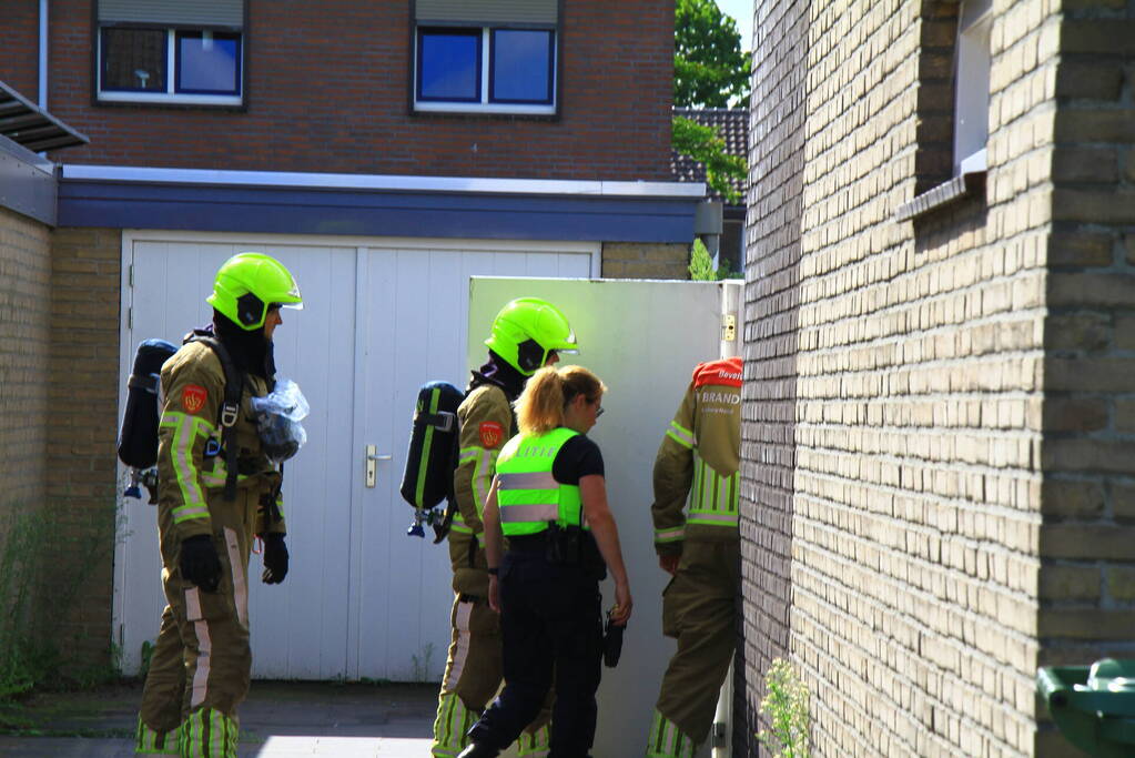 Brand in tuin van woning