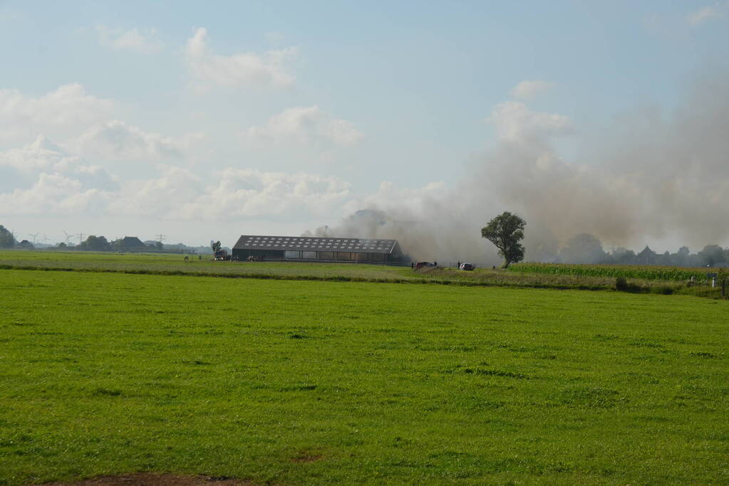 Uitslaande brand in schuur van boerderij