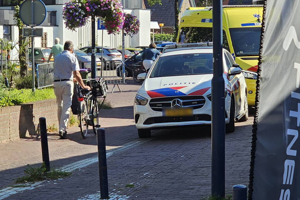 Persoon ten val met fiets