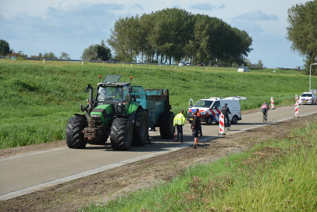 Persoon in botsing met tractor