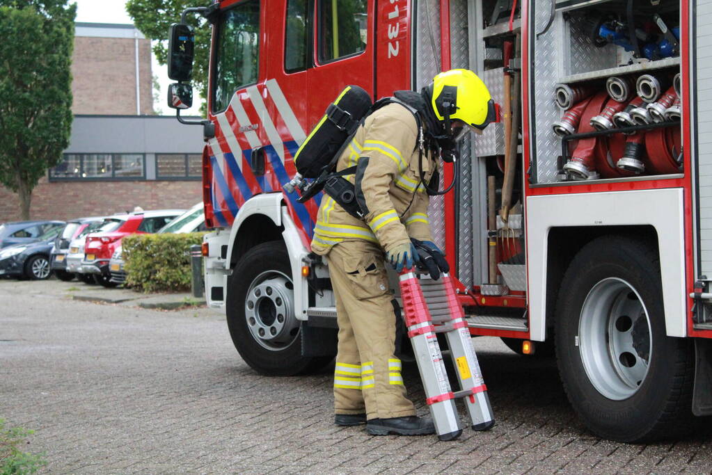 Rookontwikkeling in flat na brand