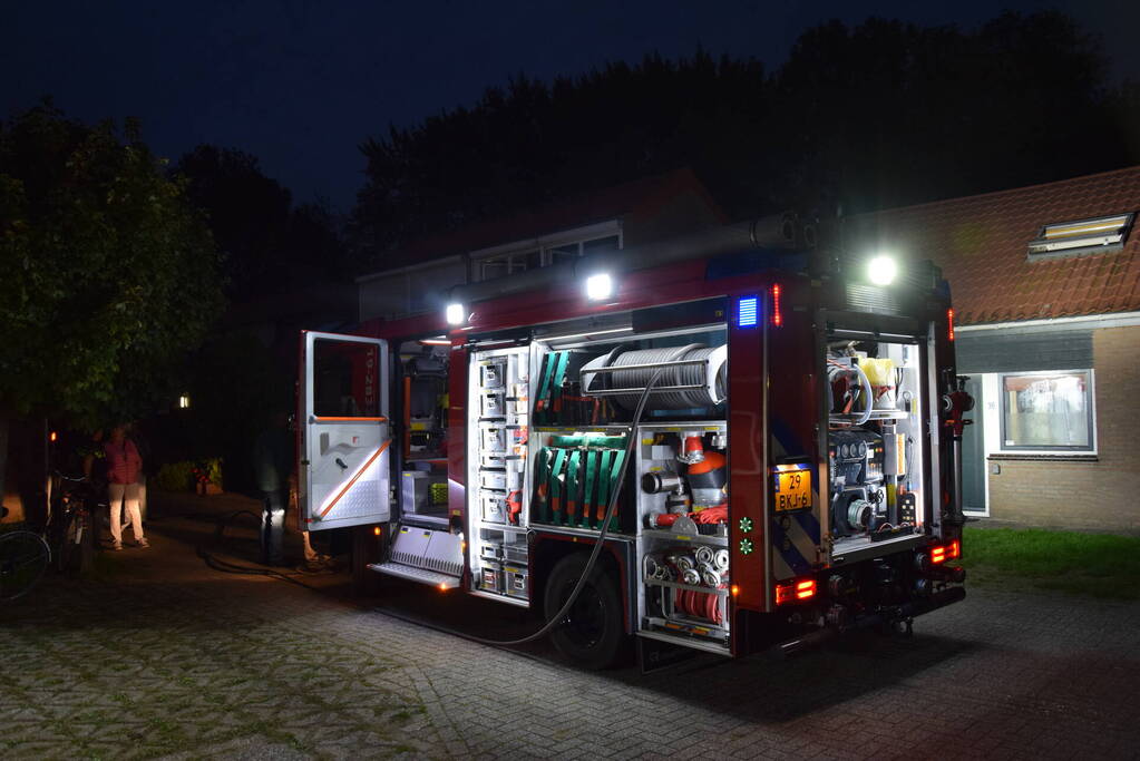 Kortsluiting koelkast veroorzaakt brand