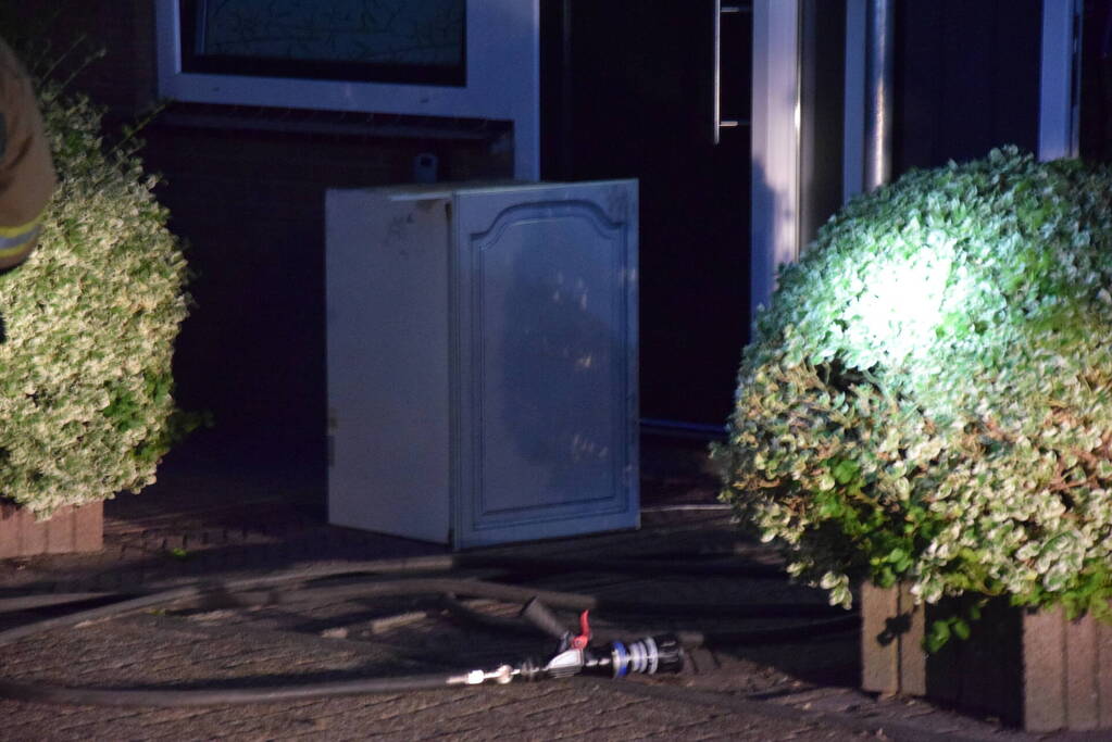 Kortsluiting koelkast veroorzaakt brand