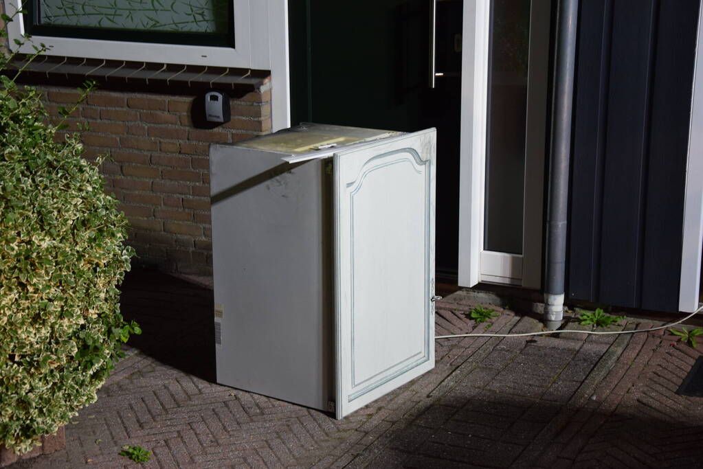 Kortsluiting koelkast veroorzaakt brand