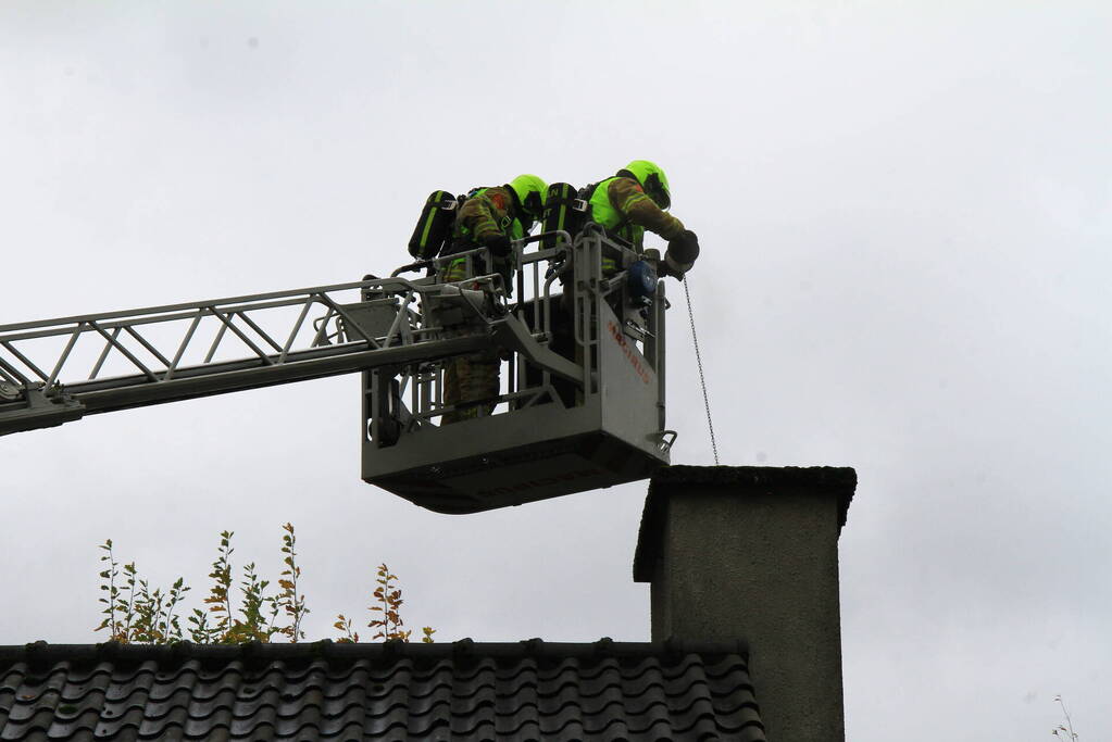 Rookontwikkeling bij brand in schoorsteen